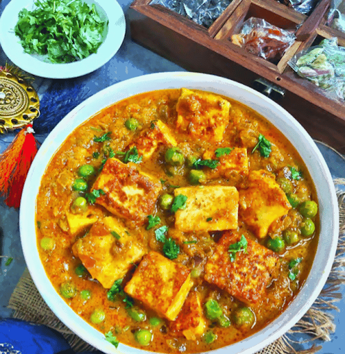 Garlic naan and curry at Nabi Grill Kebab Winnipeg